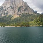 Beautiful landscape of Estany de Sant Maurici with Gran Encantat in the background, Catalonia, Spain.